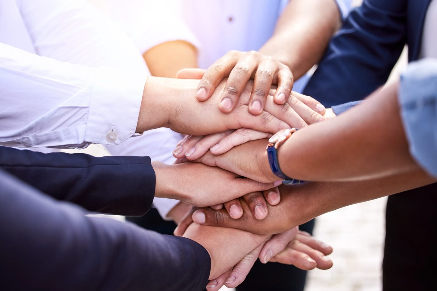 Business,,People,And,Hands,In,Stack,Outside,For,Support,,Group